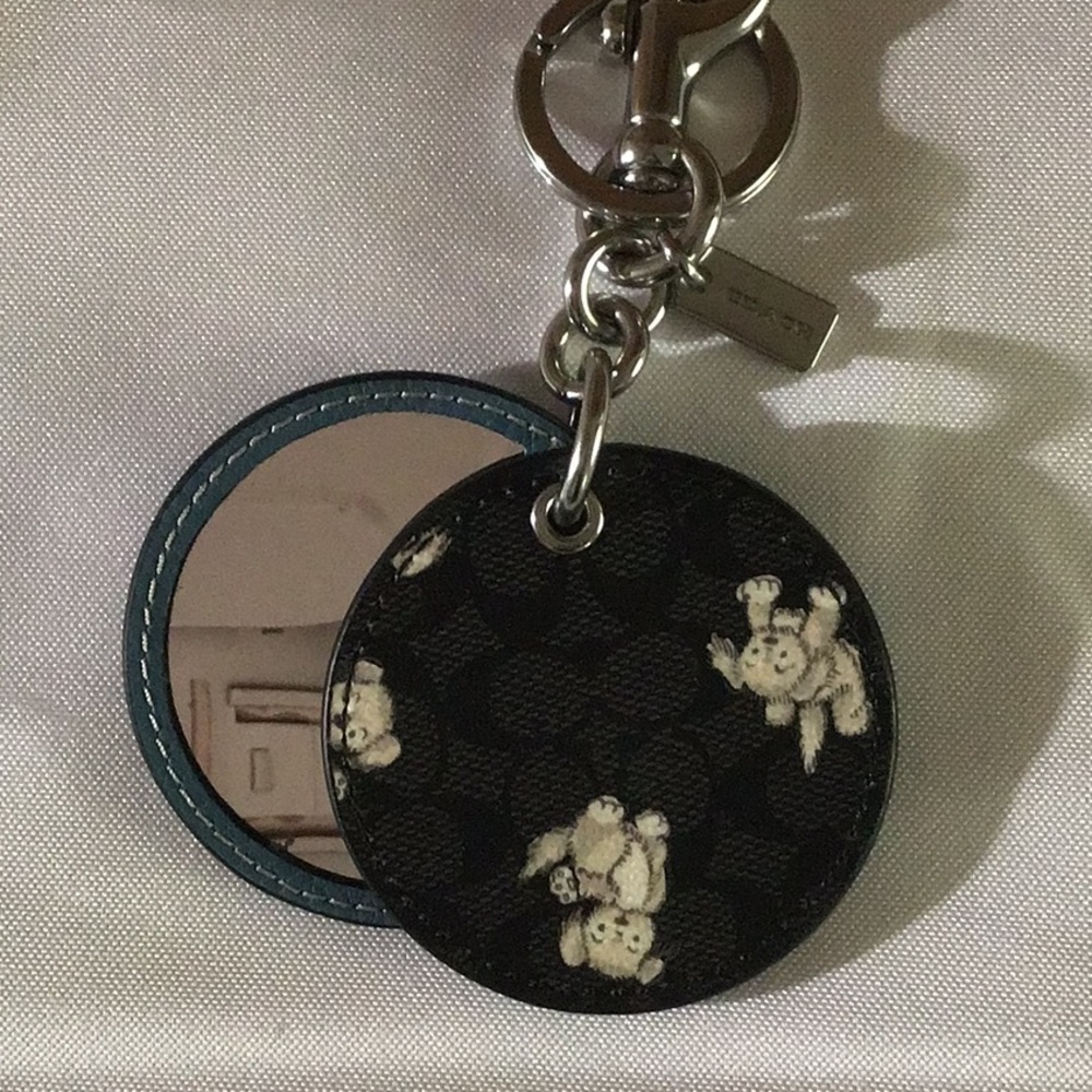 COACH dog charm